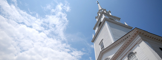 Church steeple against a blue sky