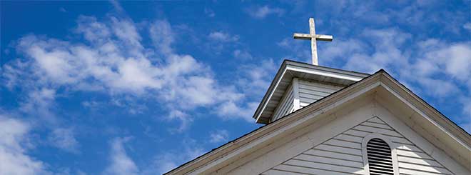 Church steeple against a blue sky