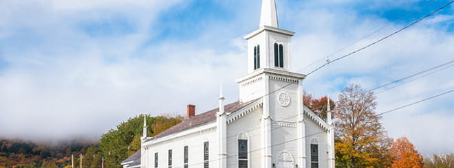 White church building in fall