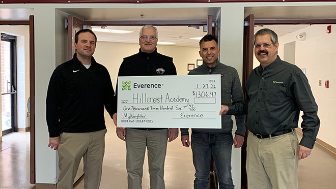 Hillcrest Academy staff with Lyle Miller (right), Everence Stewardship Consultant