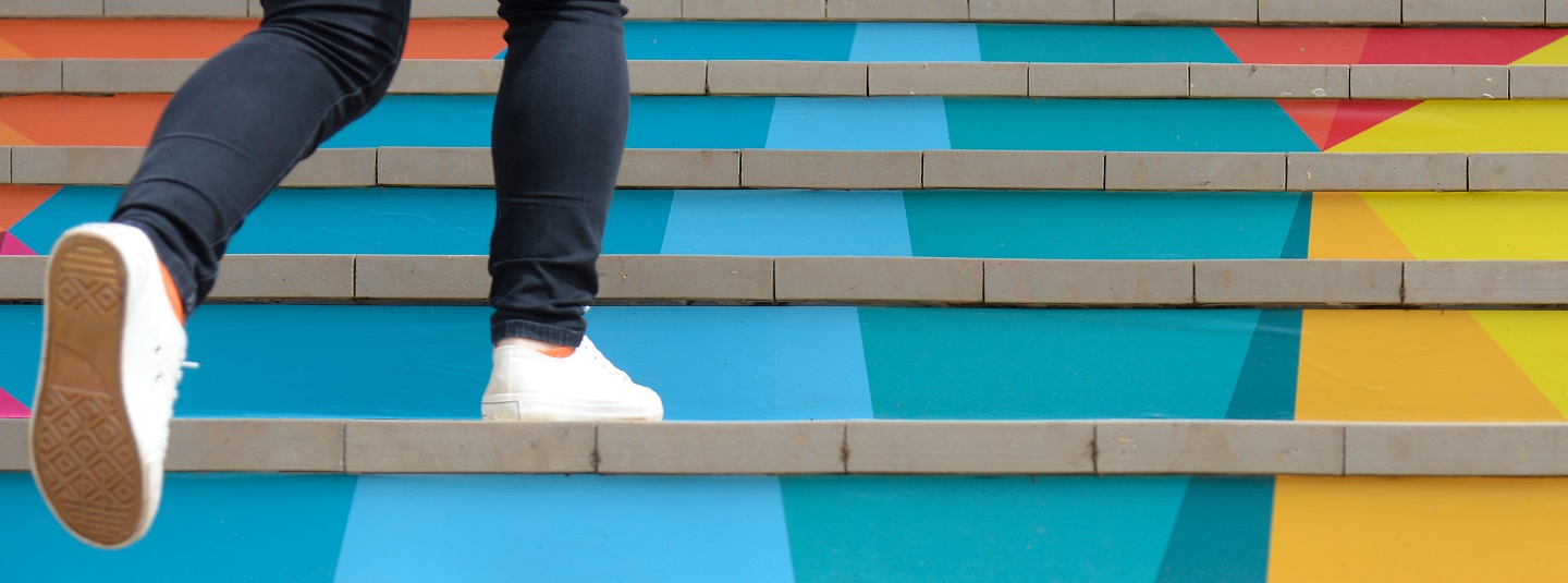 Man running up stairs