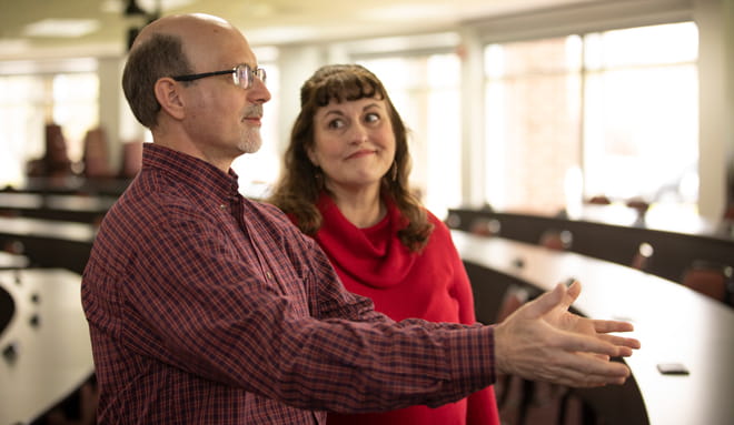 Roger and Jane Stichter in classroom