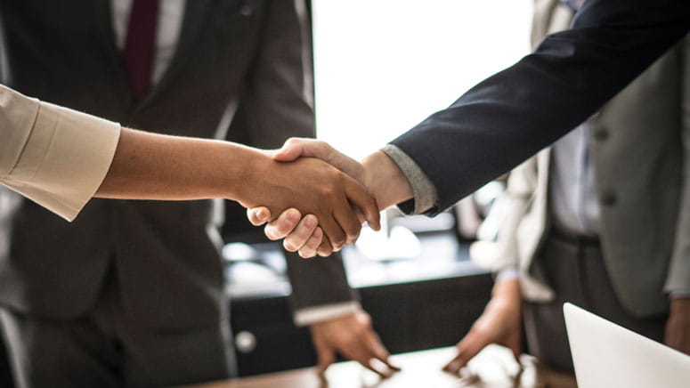 An up-close photo of a handshake