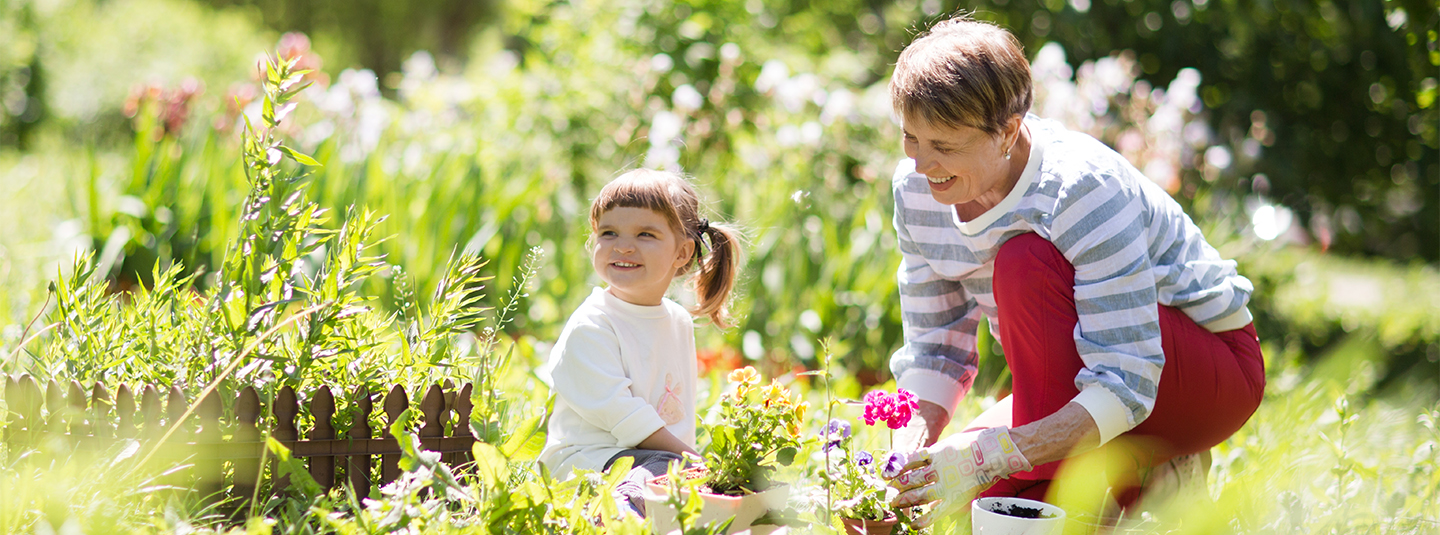 Woman with child in garden