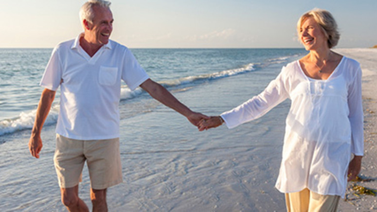 Couple walking on the beach