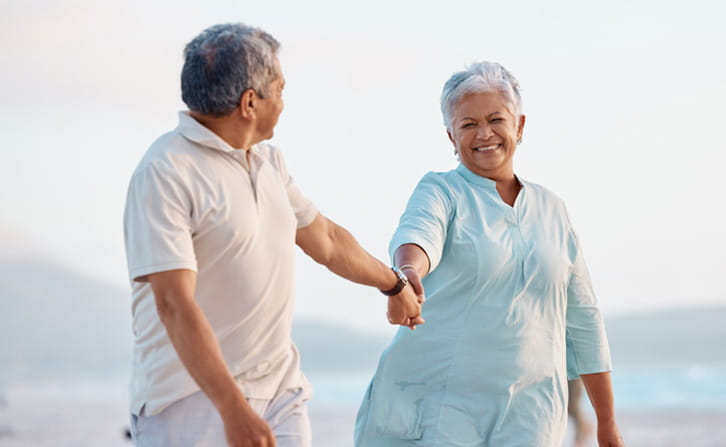 Couple walking on the beach