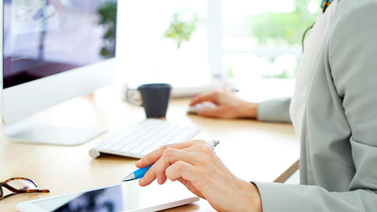 Woman working on her desktop