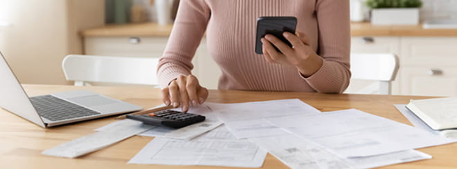 Woman calculating finances