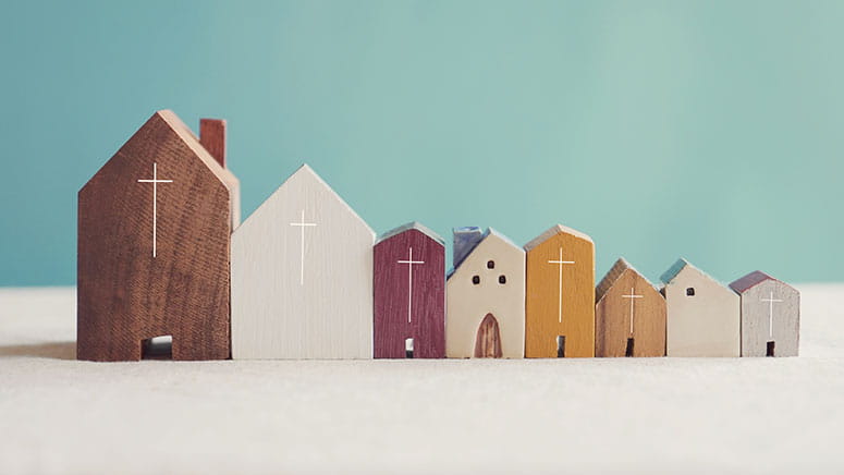 Wooden church buildings in a line