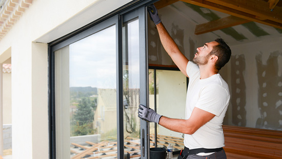 Man repairing roof 