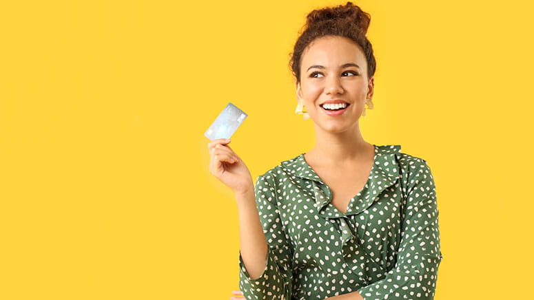 Woman holding a credit card