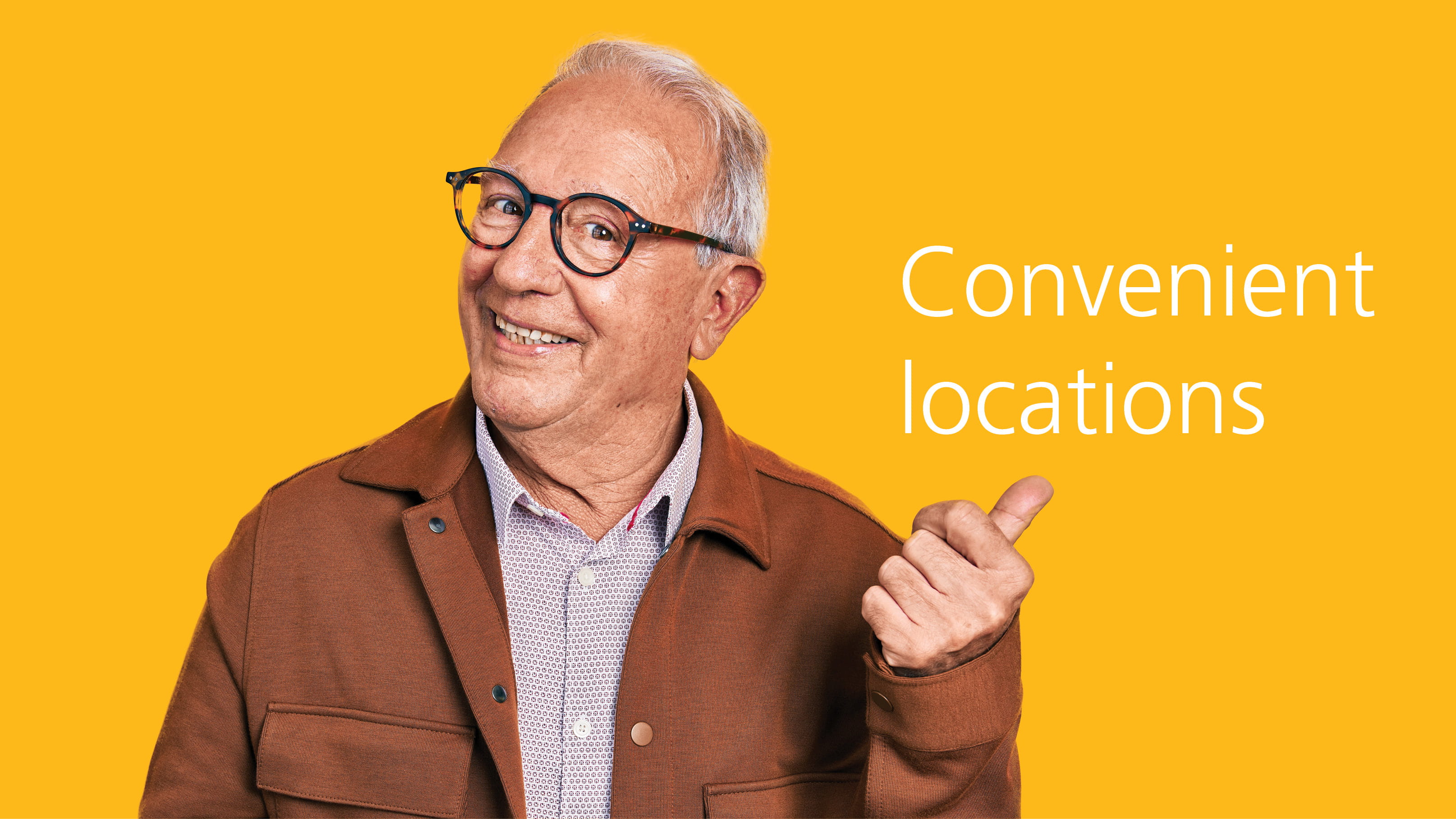 Older man pointing to words "convenient locations"