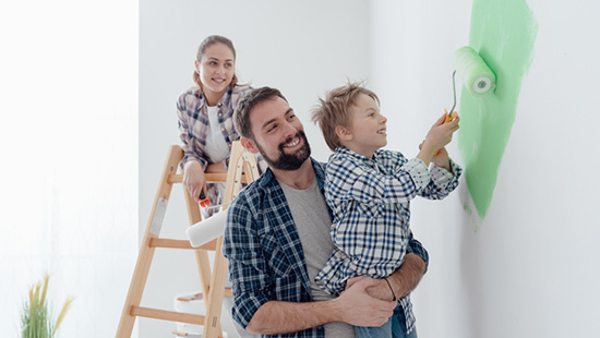 Family painting room with kid