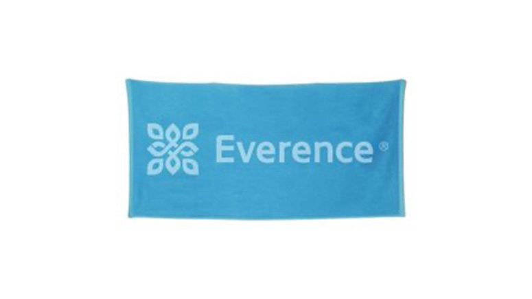 Blue beach towel with Everence logo.