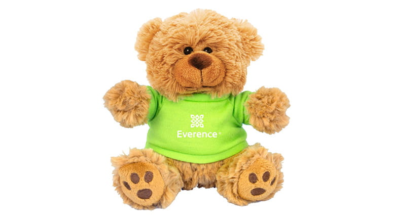 Stuffed teddy bear with a green shirt and Everence logo.