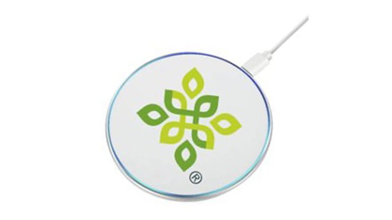 White, flat charging pad with Everence logo.