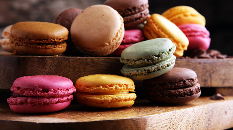 Multi-color macarons stacked up on a display