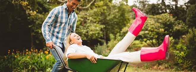 Couple playing in the garden