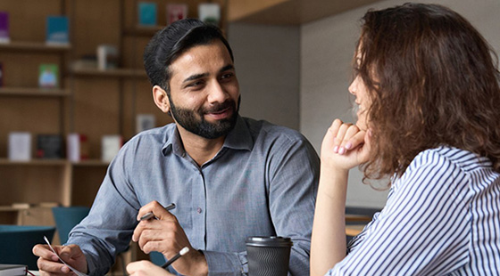 Man interacting with woman