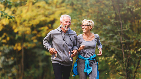 Older couple walking in nature