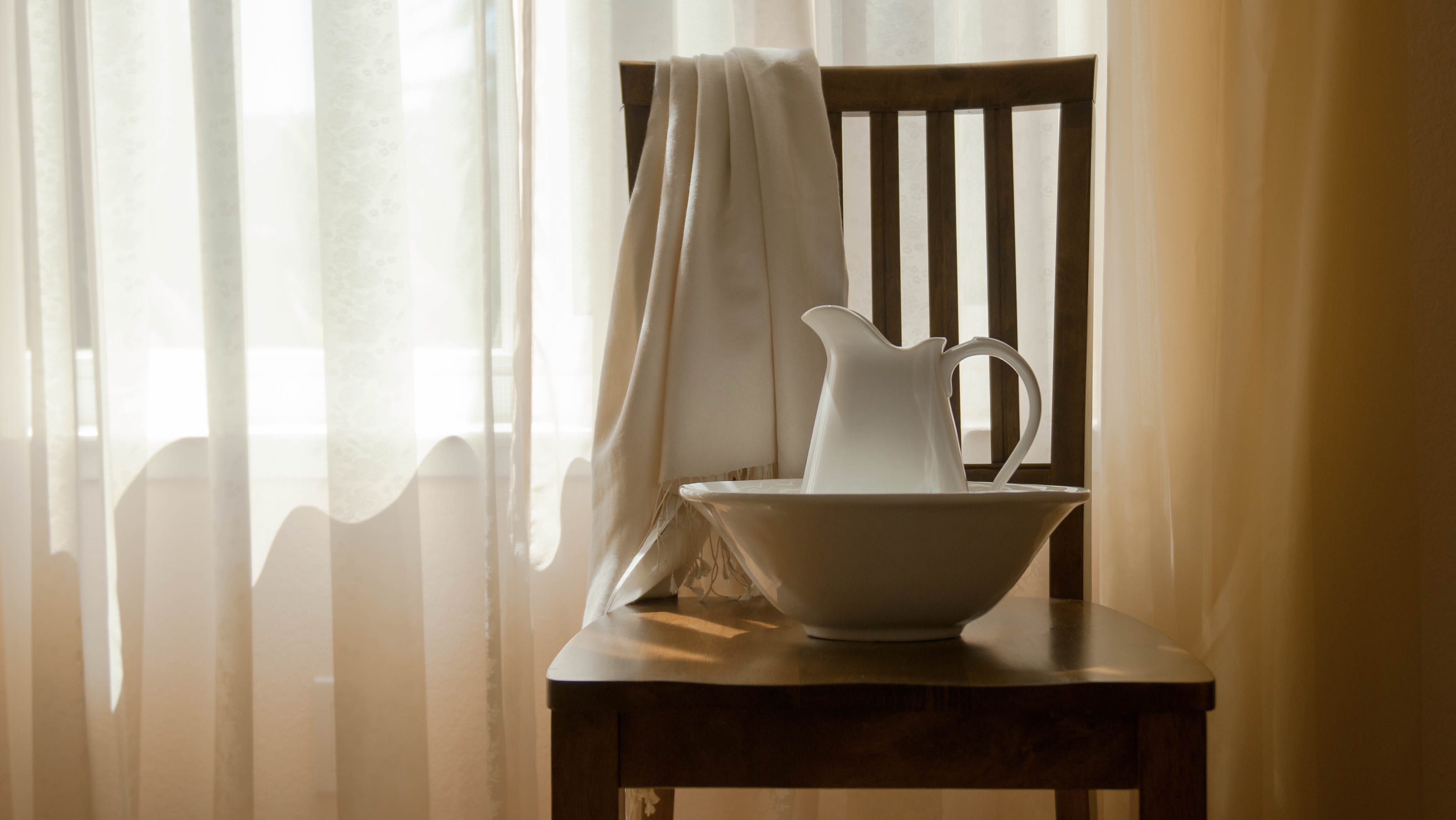 Basin and towel on a chair 