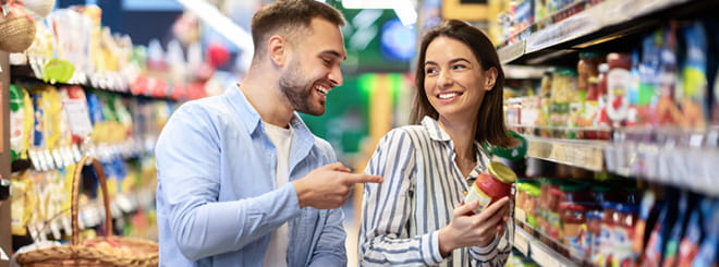 Happy couple at grocery store