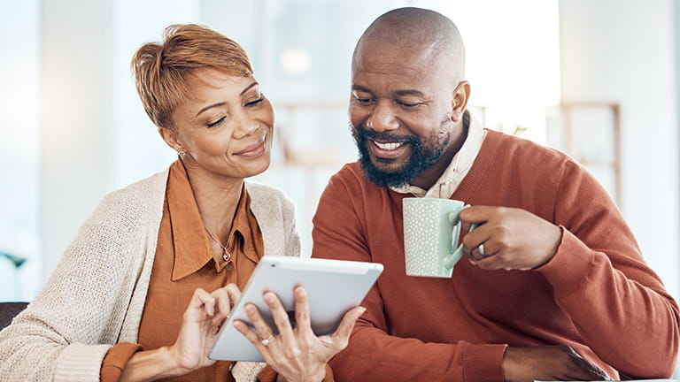 Couple looking at tablet