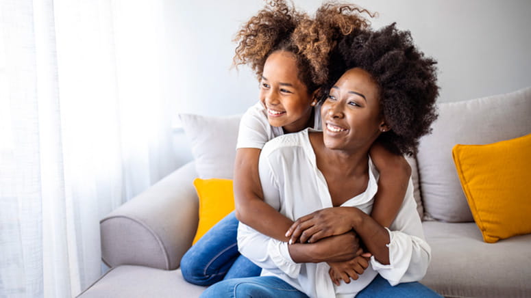 daughter hugging mom